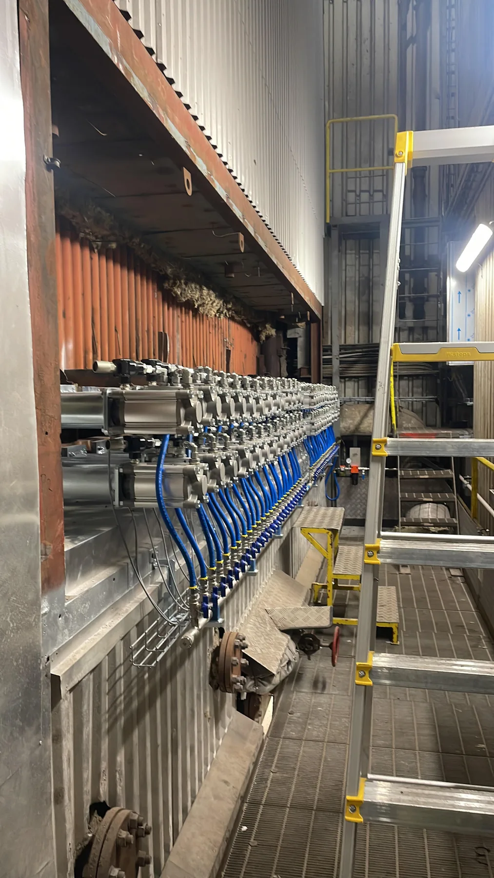 Hydraulic hammer replacement assembly on a boiler membrane wall in Halmstad - Halmstad HEMM Boiler Hydraulic Hammer Replacement, Sweden 2025